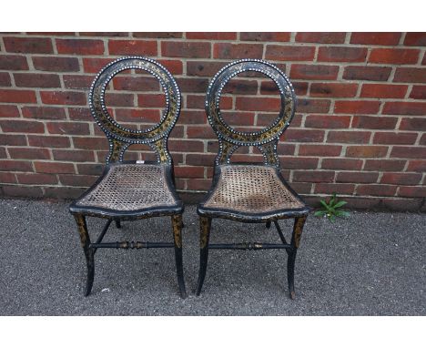 A pair of Victorian papier mache, mother-of-pearl and cane seat salon chairs, (s.d). 