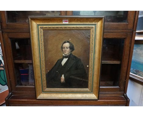 English School, 19th century, half length portrait of a seated gentleman, oil on canvas, 39 x 29cm.&nbsp; 