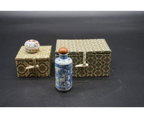 A Chinese porcelain snuff bottle and stopper, Yongzheng six character mark to base, 8.5cm high; together with another small w