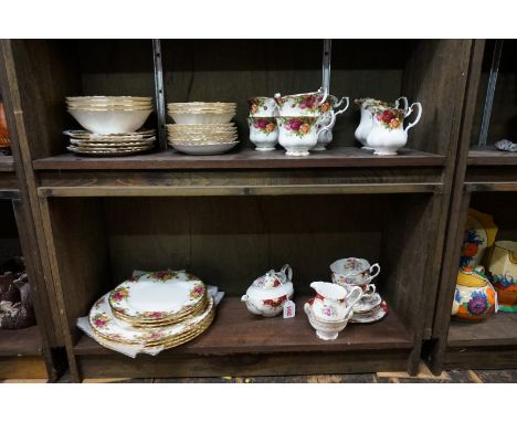A Royal Albert 'Canterbury' pattern tea for two service;&nbsp;together with a similar 'Old Country Roses' pattern part tea se
