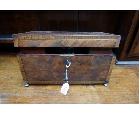 A 19th century figured mahogany, line inlaid and rosewood crossbanded tea caddy, 35.5cm wide; together with a 1930s toilet mi