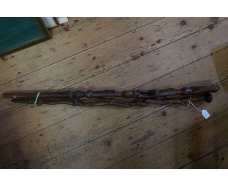 Ethnographica:&nbsp;a tribal carved wood figural stick; together with another unusual rootwood stick.&nbsp;&nbsp; 