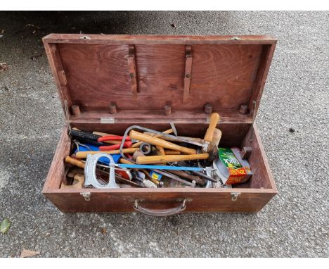 A small wooden chest containing tools.&nbsp; 