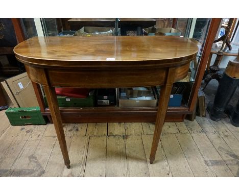 A George III mahogany and line inlaid 'D' shaped card table, with double gateleg action, 91cm wide. 