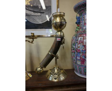 An unusual brass and horn cornucopia candlestick, 55cm high. 