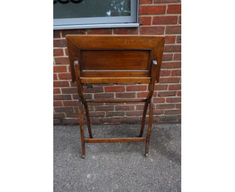 A vintage mahogany campaign style folding desk, 61.5cm wide.&nbsp; 