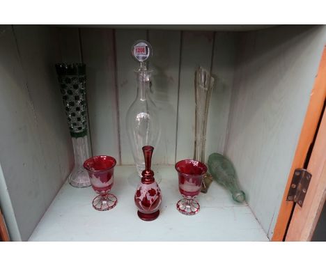 An Orrefors clear glass decanter and stopper, 42cm high; together with two German ruby flashed spar goblets, 13cm high; and f