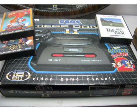 A Saga Mega Drive 2 Video Game and Console, in original box plus three games.