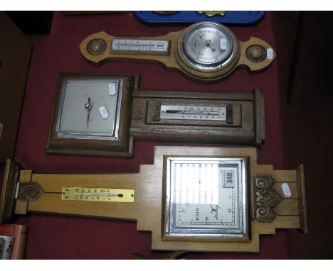 Three Oak Cased Barometer/Thermometers, circa 1940's and later in oak and mahogany. (3)