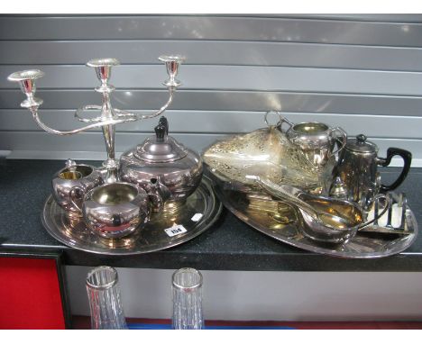 A Three Piece E.P.B.M Tea Service, plated oval and circular trays, hot water jug, twin handled footed shallow dish, candelabr
