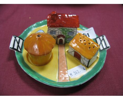 Carlton Ware Three Piece Cruet as Farmhouses, in yellow and green.