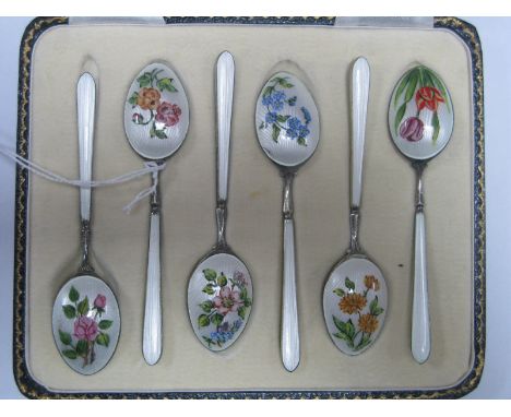 A Highly Decorative Set of Six Hallmarked Silver and Enamel Coffee Spoons, each bowl verso hand painted with differing flower