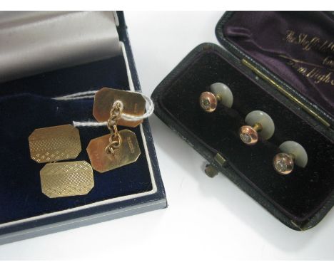 A Pair of 9ct Gold Gent's Cufflinks, the engine turned panels on chain connections; together with a set of three gent's dress