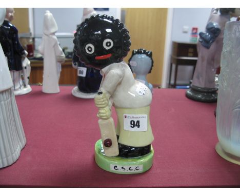 A Carlton Ware Golly Cricketer, trial 29/120, 20cm high.