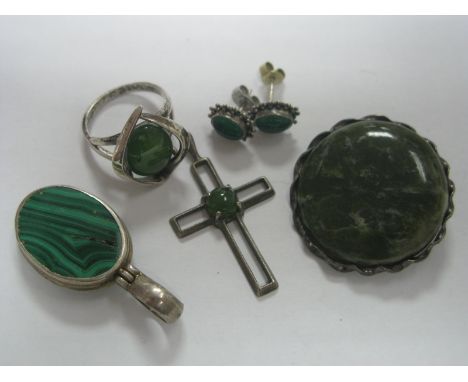 A Sterling Silver "Real Connemara Marble" Brooch; a green hardstone set ring stamped "STG"; a green hardstone set cross penda