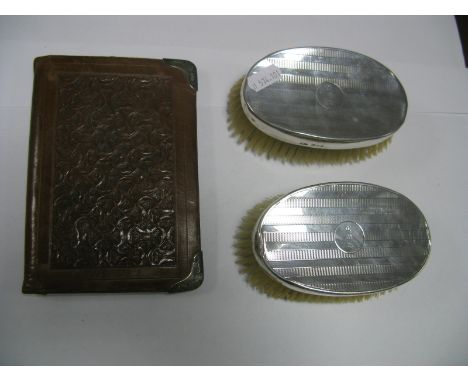 A Pair of Hallmarked Silver Backed Brushes, each engine turned and initialled "WBR"; together with a hallmarked silver mounte