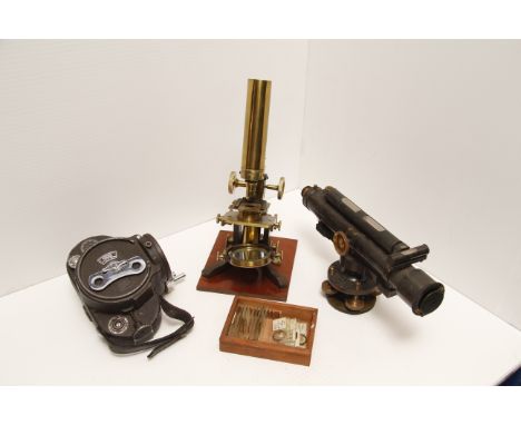 Unmarked Brass Microscope, cased with spare objective lens together with a Halden surveying instrument and a B&H Filmo lackin