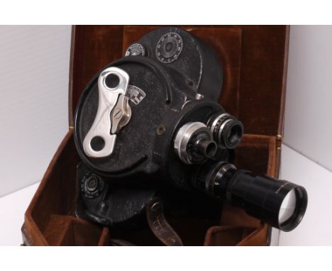 A Bell & Howell Filmo 70 Cine Camera, with Ross Cine f/1.9 1", Bell & Howell f/4.5 6" and Cooke f/2.7 1" lenses, in maker's c