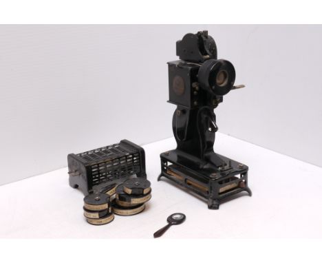 A Pathe Baby 9.5mm Projector,  with various reels