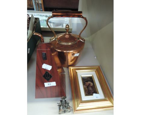 A metronome, copper kettle, print etc