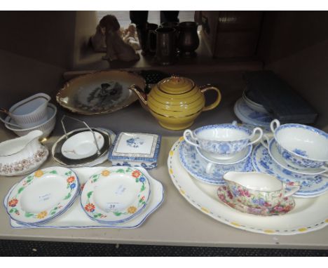 A shelf of ceramics including Limoges, Crown Ducal, Royal Albert Capri, Minton and Royal Winton etc