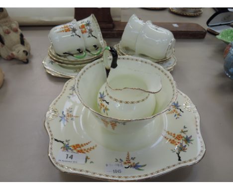 A Tuscan part tea service, cream and floral design