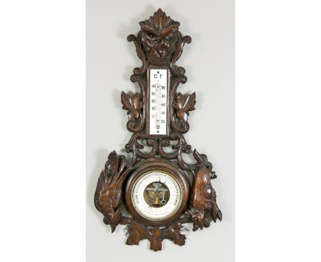   Jagdliches Barometer, 1. H. 20. Jh. Passig geschweifte und beschnitzte Holzplinthe mit   gerahmtem Thermometer und Baromete
