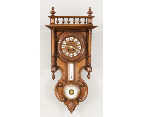   Wanduhr Holz geschnitzt und mit gedrechselter Galerie, mit Barometer und Thermometer,   Holzzifferblatt mit aufgesetzte wei
