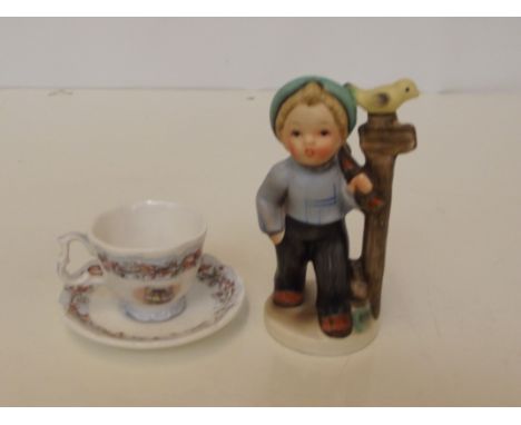 Royal Doulton duon Winter design together with a Goebel figure