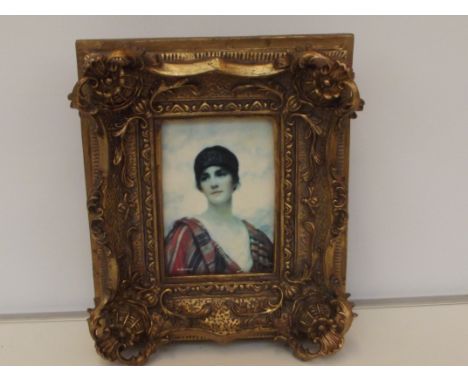 Austrian portrait plaque set in a thick gilt swept frame, 