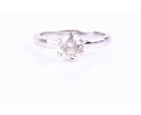An 18ct white gold and solitaire diamond ring, the round brilliant-cut diamond of approximately 1.08 carats, approximate clar
