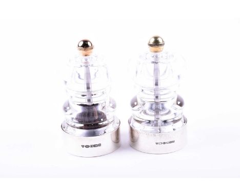 A contemporary French silver salt and pepper grinder, named 'Peugeot', bearing London import hallmarks, 10 cm high.Qty: 2