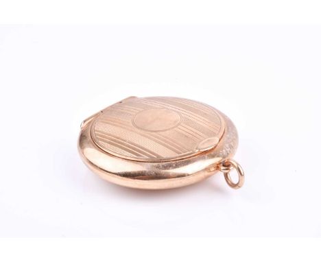 A 9ct yellow gold powder compact, with engine-turned decoration, the hinged lid fitted with mirror, containing powder compart