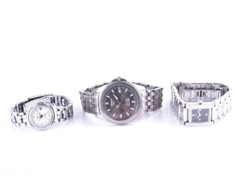 A collection of three Tissot wristwatches, comprising a Tissot Titanium PRC100 watch, and two ladies watches. (3)