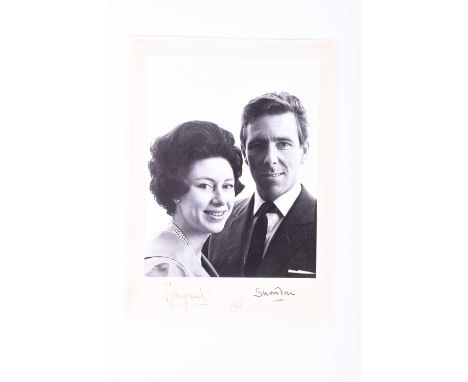 TRH The Princess Margaret and Lord Snowdon, a signed presentation portrait photograph of the Royal couple, signed in ink on m