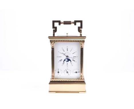 A L'Epee French brass carriage clock with calendar, moonphase and alarm complications, the white enamel dial signed L'Epee Fo