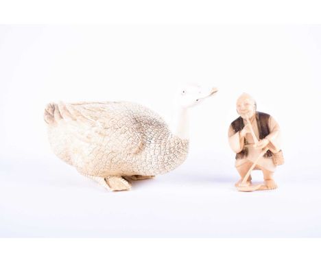 A Japanese carved ivory duck, Meiji period, naturalistically carved with well detailed feathers, two character red signature,