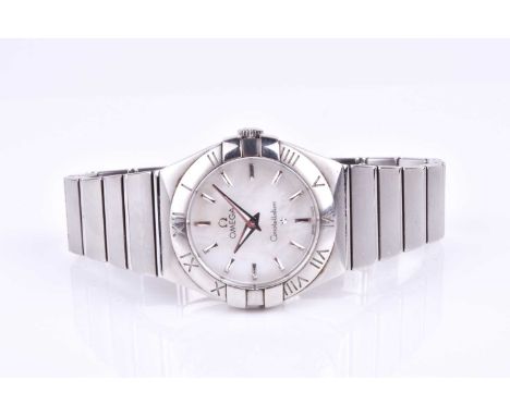 A ladies Omega Constellation wristwatch the mother-of-pearl dial with baton indices, the bezel with Roman numerals, on a stai