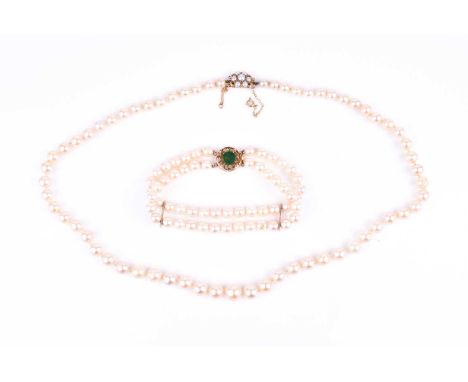 A cultured pearl necklace, the graduated pearls measuring from 4 - 9 mm, fastened with a 9ct yellow gold and pearl clasp, 51 