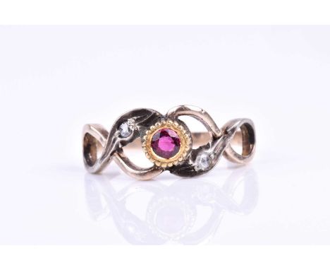 A yellow metal, silver, diamond, and ruby ring, centred with a mixed round-cut ruby in a yellow gold bezel setting, the swirl