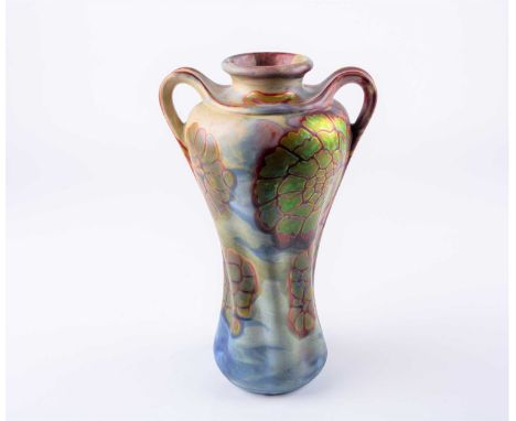 A Zsolnay Pecs irridescent vase of art nouveau design, with twin handles and ribbed body, numbered 6194, 25 cm high.Condition