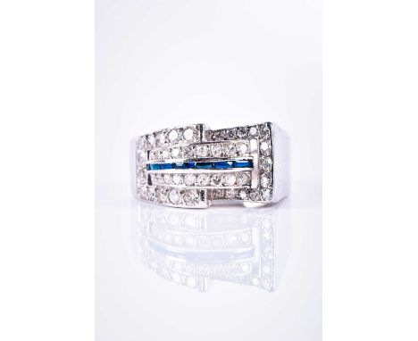 A diamond and sapphire ring, in the Art Deco taste, the white metal buckle-style mount inset with round brilliant-cut diamond