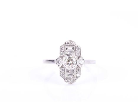 A diamond and platinum ring, in the Art Deco style, the lozenge-shaped mount centred with a collet-set round brilliant-cut di