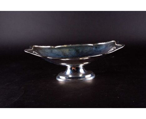 A George VI silver pedestal bowl, Sheffield 1945 by L &amp; W, of oval form with shaped rim, 28 cm x 10 cm high, 19 ozt.