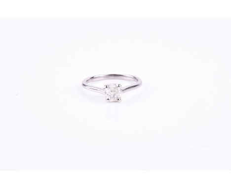 A 14ct white gold and diamond ring, set with a rectangular cushion-cut diamond of approximately 0.45 carats, approximate colo