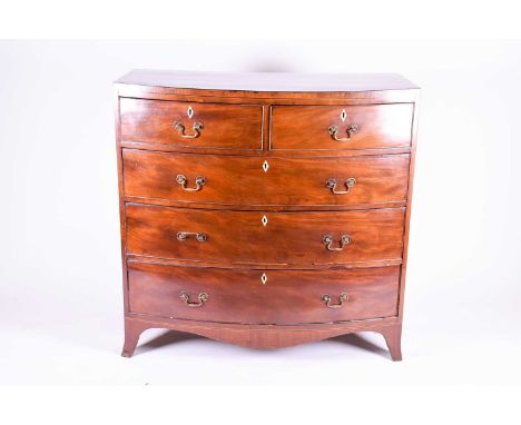 A Victorian mahogany bow-front chest of drawers, with two short and three long graduated drawers, with brass handles and bone