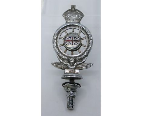 A Royal Automobile Club car mascot, a union jack flag on one side, the profile of Edward VII inside a spoked wheel, with its 