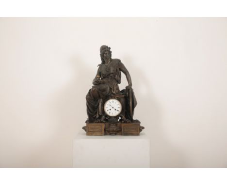 A FIGURAL MANTEL CLOCK19th/20th century, modelled with enthroned Athena attired in half-armour and Corinthian helmet whilst h