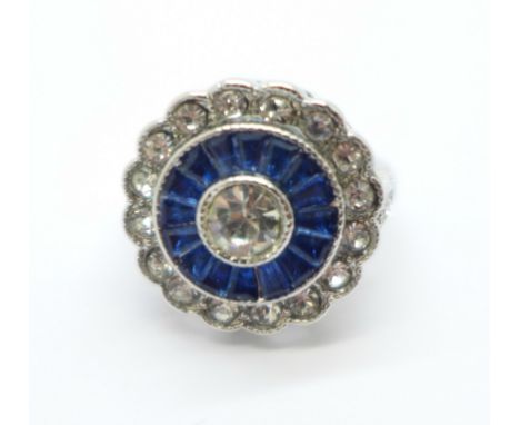 An Art Deco style 'blue flower' dress ring, size K 