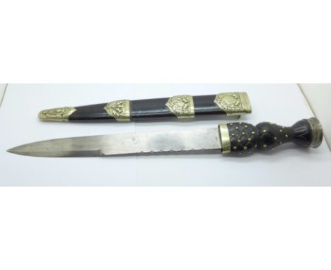 A Scottish dress dagger with scabbard, the blade marked Mole &amp; Sons, Birmingham, the scabbard marked SEAD 3, length with 